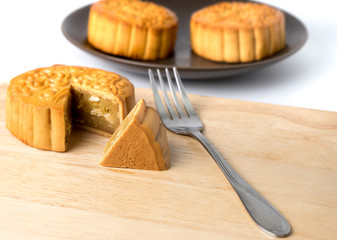 Chinese traditional mooncake , on wooden cutting boards