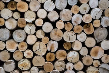 Möbelaufkleber closeup of a pile of cut timber background © marchsirawit