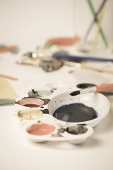 paintbrush on color dish aged tone