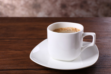 Cup of coffee on table close up