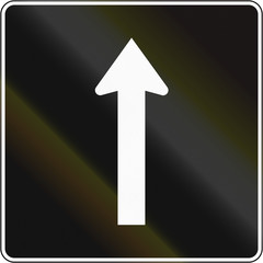 Lane management sign in Canada - Lane for straight through. This sign is used in Quebec