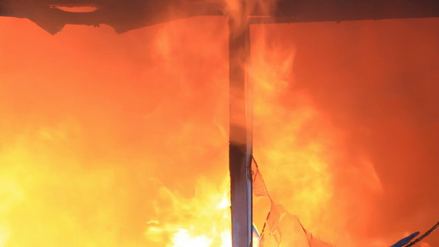 Intense house fire through window P HD 7909