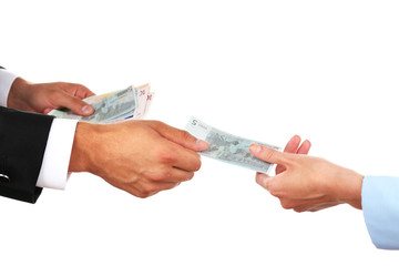 Woman hand takes money from the man's hand, isolated on white