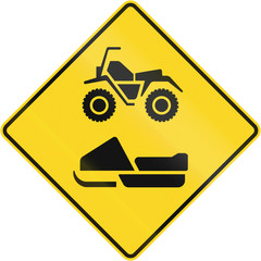 Warning road sign in Quebec, Canada - Snowmobiles and ATVs