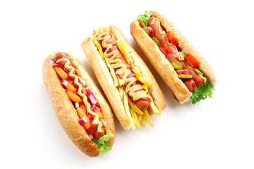 Three fresh hot dogs isolated on white