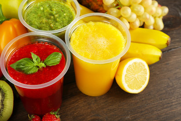 Fresh juice mix fruit, healthy drinks on wooden table background