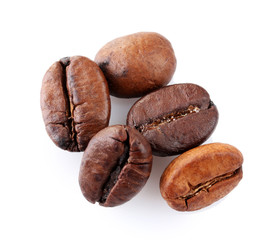 Brown coffee beans isolated on white