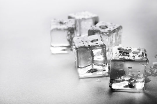 Clear melting ice cubes, close up
