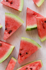 Sliced watermelon on wooden table closeup