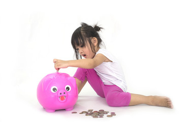 Asian children with pink piggy bank
