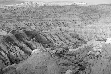 Badlands landscape, formed by deposition and erosion by wind and water, contains some of the richest fossil beds in the world, Badlands National Park, South Dakota, USA
