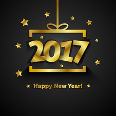 Golden gift box with 2017 Happy New Year greeting card