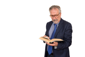 Senior teacher standing reading a book, isolated on white backgr