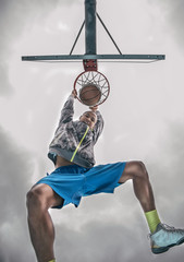 Basketball player doing a slam dunk