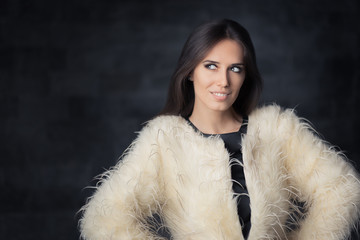 Beautiful Winter Woman Wearing Fur Coat 