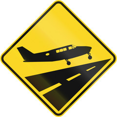 Warning road sign in Quebec, Canada - Low flying airplanes