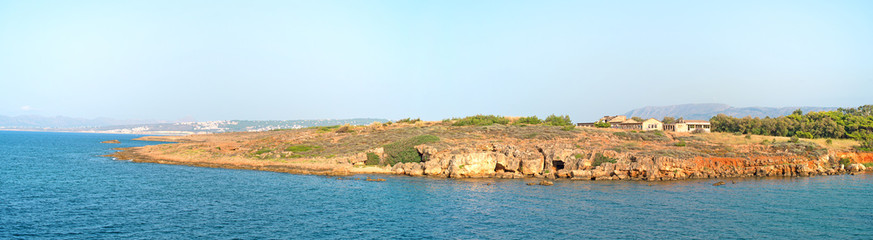 Wild stone beach on the island.