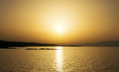 Sunset over the sea. Photograph from the beach.