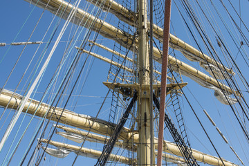 Fototapeta premium Old sailing ship masts sails and rigging