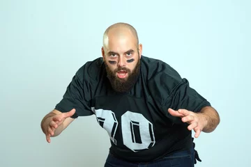 Outdoor kussens bearded american football player © Firma V