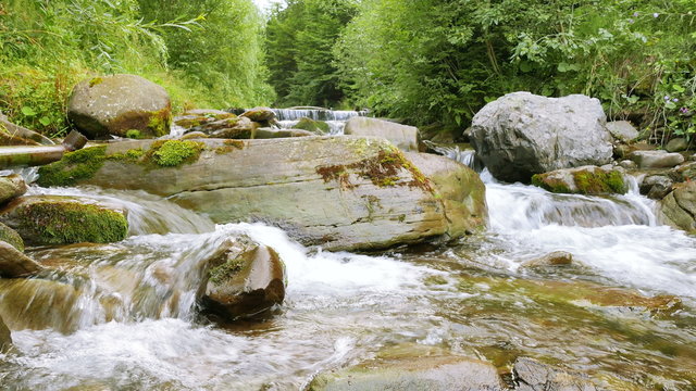 
Beautiful stones in a mountain stream.   4K 3840x2160. 
