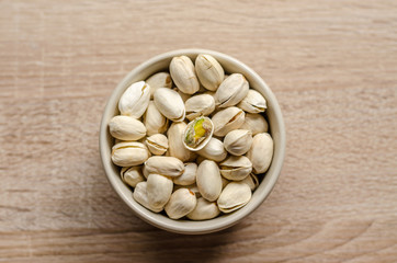 Close up Pistachios Nuts on wooden background