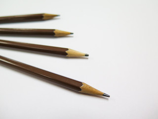 Wooden pencil isolated on white background