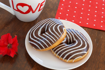 Donut colored zebra on a plate. top view. space for inscriptions.