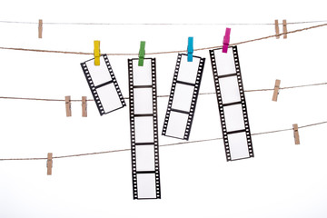 colorful clip on a  twine, hanging Photographic Negatives