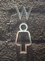 Toilet sign on wall
