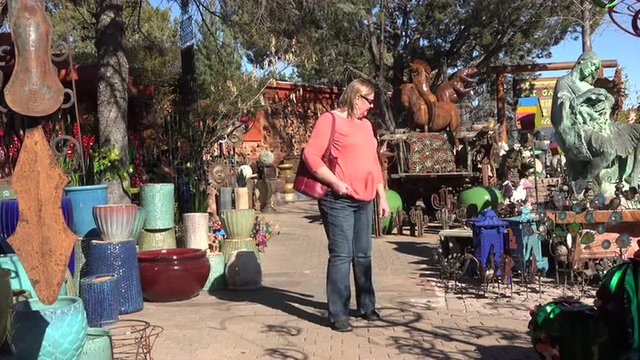 Sedona Arizona woman walking tourist market 4K 003