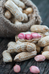 seed peanut on wooden background