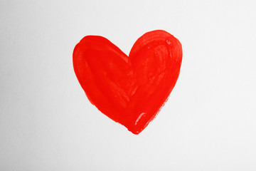 Painted heart on white paper background
