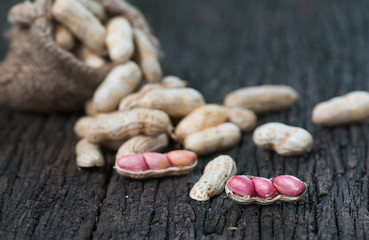 seed peanut on wooden background