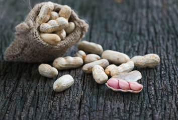seed peanut on wooden background
