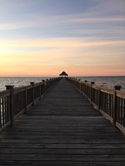 pier at sunset on the gulf