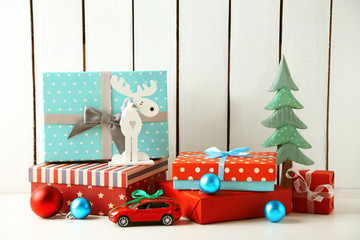 Christmas gifts on wooden background