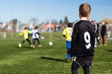 Fototapeta premium Young boy during soccer match