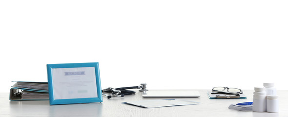 Doctor table with tools on white background