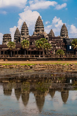 Front of Angkor Wat with reflection in water