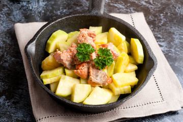 Salmon with zucchini decorated parsley