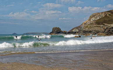 Fototapeta na wymiar Surfing off Perranporth beach