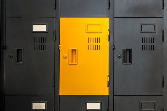 Yellow Locker amongst Black Ones