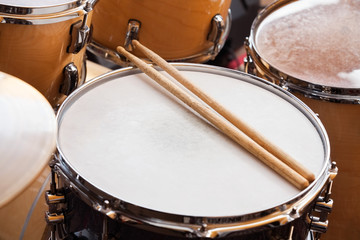 Fototapeta na wymiar Sticks On Drum In Recording Studio