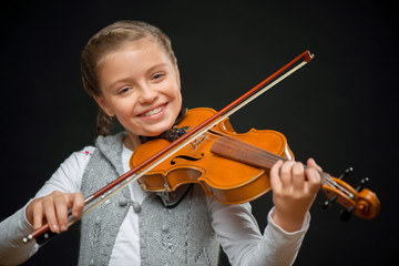 Nice girl playing the violin  © Viacheslav Yakobchuk