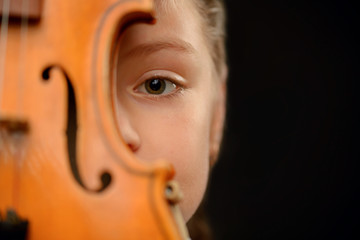 Nice girl playing the violin 