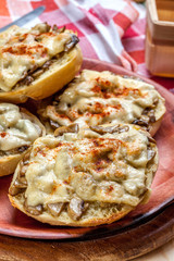 Sandwiches with mushrooms and cheese.