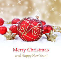 Colorful christmas decoration baubles on white with space for text
