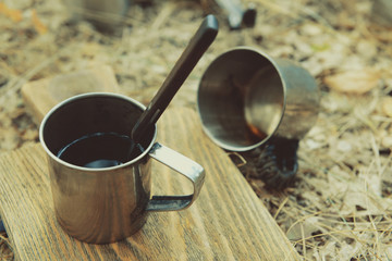 Metal dish for tourism on the ground in forest