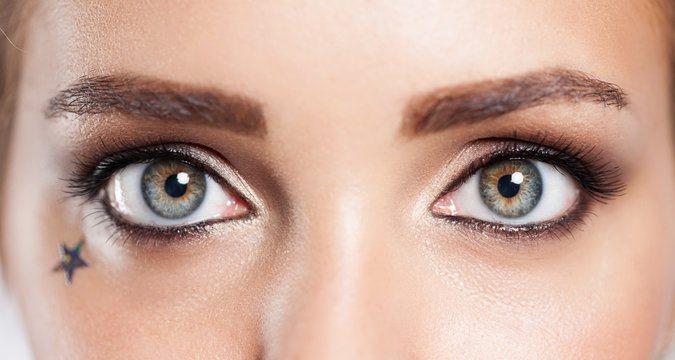 Close up of the eye of a girl with an evening make-up fashion
